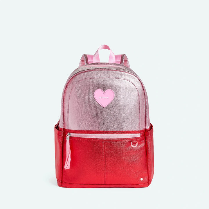 Pink and red backpack with a heart design