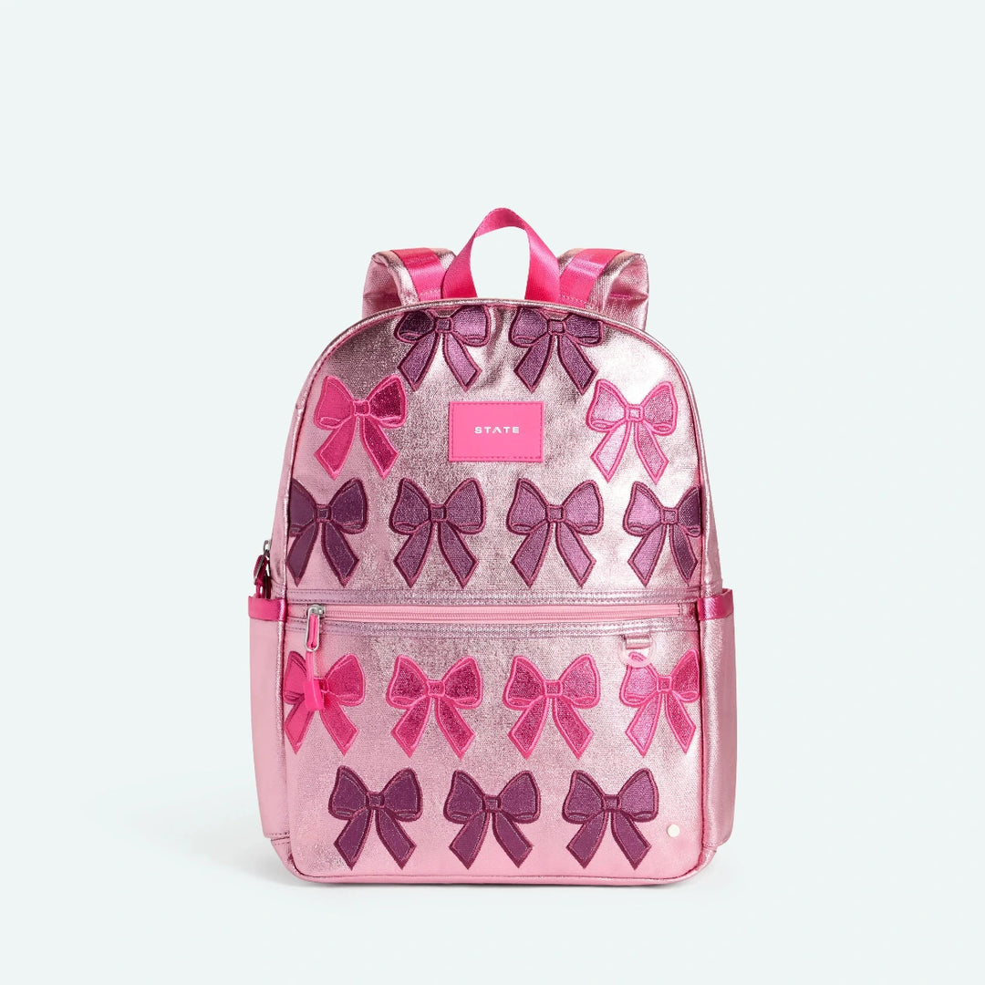 Pink backpack with purple and pink bows