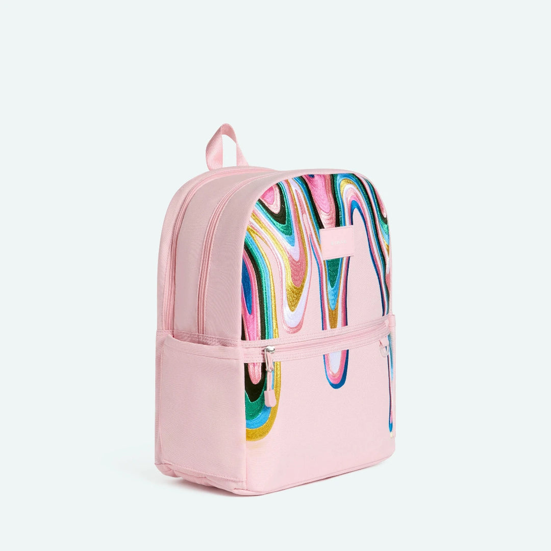 Pink backpack with colorful abstract design